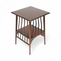Liberty & Co., attributed. An Aesthetic Movement Walnut Side or Occasional Table with a Square Top