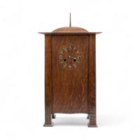 C. F. A. Voysey (1857–1941). A rare Arts and Crafts oak mantel clock