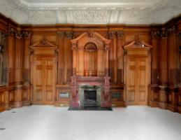 A highly Important museum-quality fireplace and matching panelled room exhibited at the Paris Universal Exhibition in 1878. Winning a Gold Medal. Made by George Trollope and Sons