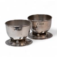 C. R. Ashbee GOH. A Rare Pair of Arts & Crafts Handcrafted Hammered Silver Salts