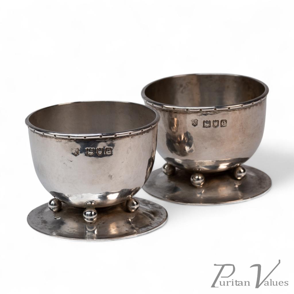 C. R. Ashbee GOH. Rare Pair of Arts & Crafts Handcrafted Hammered Silver Salts