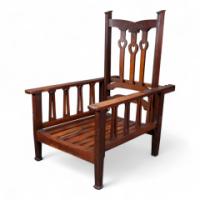 Liberty & Co., attributed. An Arts and Crafts Reclining Armchair with Carved Floral Details - Thumbnail 4