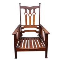 Liberty & Co., attributed. An Arts and Crafts Reclining Armchair with Carved Floral Details - Thumbnail 3