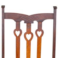 Liberty & Co., attributed. An Arts and Crafts Reclining Armchair with Carved Floral Details - Thumbnail 15