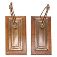 Birmingham Guild of Handicraft. A rare pair of Arts & Crafts patinated bronze wall lights