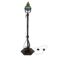 Alfred Bucknell. A Handmade Steel Standard Lamp with Fine Chased Details