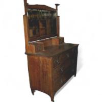 A Good Quality Oak Arts & Crafts Dressing Table with Stylised Floral Carving to the Top