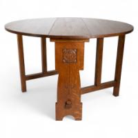 Liberty & Co., An Arts & Crafts 1/4 Salon Oak Drop Leaf Table with Stylised Floral Carved Decoration - Thumbnail 1