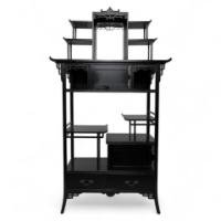 Heals, attributed. An Anglo-Japanese Ebonized Side Cabinet with Japanese Fretwork