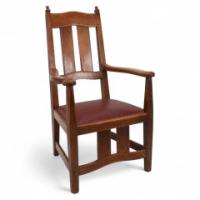 W R Lethaby. A Rare Arts & Crafts Sculptured Oak Armchair with Shaped Arms