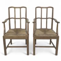 Heals attributed. A Pair of Cotswold School Arts & Crafts Oak Lattice Back Armchairs