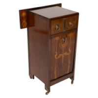 Liberty & Co., attributed. An Arts & Crafts Coal Purdonium with Inlaid Floral Details