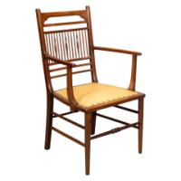 E. W. Godwin, attributed. An Anglo-Japanese Walnut Spindle Back Armchair