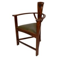 M H Baillie Scott. An Arts & Crafts Walnut Armchair with stylised floral carving - Thumbnail 1