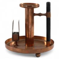 WMF an Aesthetic Movement Copper Chamber Candlestick in theDr. C. Dresser Style