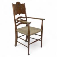 William Birch. An Arts & Crafts Oak Armchair with Glasgow-Style Floral Carving