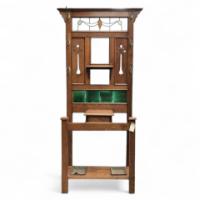 An Arts and Crafts oak hallstand with leaded glass panel to top - Thumbnail 1