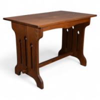 Liberty & Co., attributed. A Small Arts & Crafts Oak Dining Table