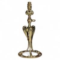 Arts and Crafts brass lamp with floral stem and heart pierced base c.1900