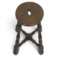 An Aesthetic Movement Elm Stool with a 'S' Handle, & a Wild Grain to the Seat