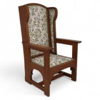 E G Punnett, attributed. Probably by William Birch & Retailed by Goodyers. An Arts & Crafts Oak Wing Back Hall Armchair