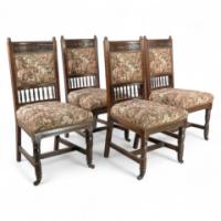 E. W. Godwin, attributed. A Set of Four Aesthetic Movement Oak Dining Chairs