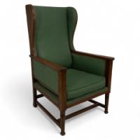 Walter Skull High Wycombe. An Arts & Crafts Oak Wing Back Upholstered Armchair