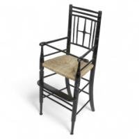 Liberty & Co. An Argyle Aesthetic Movement ebonized rush seat child's high chair - Thumbnail 1