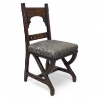 Charles Bevan, attributed. A Gothic Revival Oak Side Chair with Carved Decoration