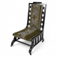 Liberty & Co., attributed. A Moorish Ebonized Parlour Chair with Moucharabieh Turnings - Thumbnail 1