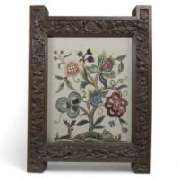 A Large Gothic Revival Picture Frame with Stylized Floral Carvings
