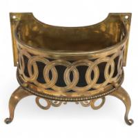 Birmingham Guild of Handicraft, attributed. A Gilded Semi-circular Brass Planter