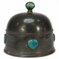 William Hutton, Probably for Liberty & Co., An Arts & Crafts Pewter Muffin Cover Inset with Ruskin Jewels
