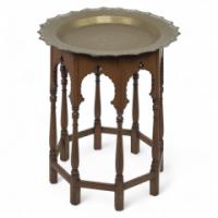 Liberty & Co., attributed. The Retailer. A Moorish-style Side Table with a Heavy Brass Removable Dish-shaped Table Top