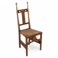 Shapland & Petter. An Arts & Crafts Oak Desk or Side Chair with Pierced Hearts