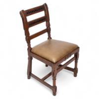 J. P. Seddon, attributed. An Aesthetic Movement Oak Side Chair with Ebonized Circles