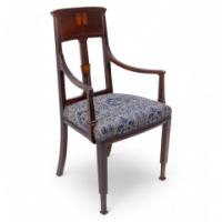 G. M. Ellwood for J. S. Henry, attributed. An English Arts & Crafts Mahogany Armchair