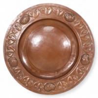 A Large Arts & Crafts Hand Formed Copper Charger with Stylised Decoration c.1900