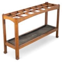 An Arts & Crafts Oak Stick & Umbrella Stand with Fourteen Sections