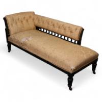 Charles Bevan for Marsh & Jones. An Aesthetic Movement Walnut Ebonized Button Back Chaise Lounge