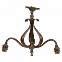 An Arts & Crafts Three Branch Brass Ceiling Light with Stylized Leaf Detail
