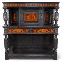 Daniel Cottier, attributed. An Aesthetic Movement Oak Sideboard in the Queen Anne Style