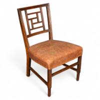 E. W. Godwin, attributed. An Anglo-Japanese Aesthetic Movement Walnut Side Chair with a Lattice Style Back