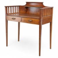 Wylie & Lochhead, attributed. A Good Arts & Crafts Oak Desk with a New Leather Writing Area