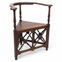 Jas Shoolbred. An Aesthetic Movement Oak Corner Armchair with Stylized Turnings - Thumbnail 1