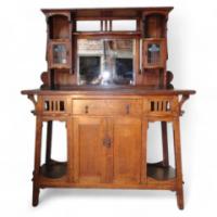 Wylie and Lochhead. An unusual Arts and Crafts oak sideboard attributed - Thumbnail 1