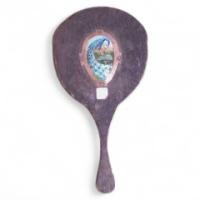 A vanity mirror with an enamelled stylised Peacock to the back and an enamelled letter amongst green heart shaped leaves. - Thumbnail 1