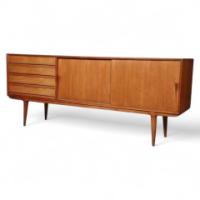 A rare Model 18 teak sideboard having four drawers and two sliding doors - Thumbnail 1