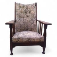An Arts and Crafts oak reclining armchair with large flat extended arms - Thumbnail 1