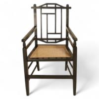 An Anglo-Japanese ebonised cane armchair - Thumbnail 1